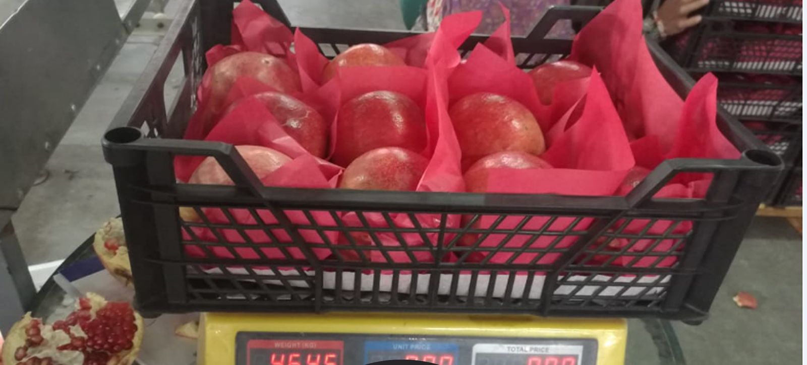 Weighing packed fruit